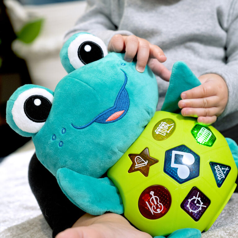 Baby Einstein - Jouet musical Ocean Explorers Neptune's Cuddly Composer