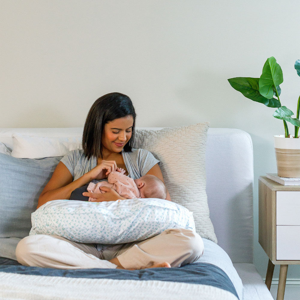 Nursing pillow hotsell with toy bar
